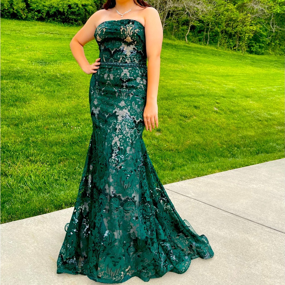Prom dress.  Worn once. Forest green with nude underlay.